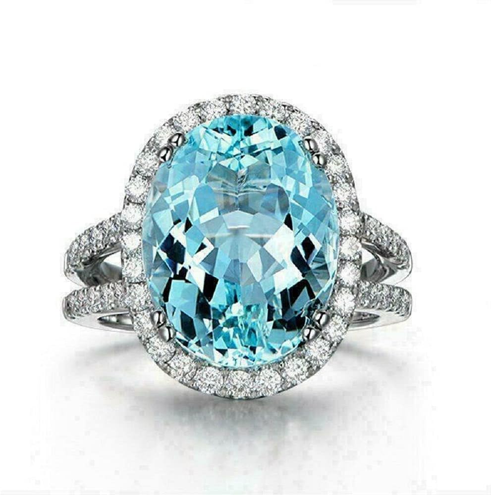 Oval Cut & Roound Cut Aquamarine & Cubic Zirconia 14k White Gold Plated 925 Sterling Silver Halo Engagement Ring For Womens.